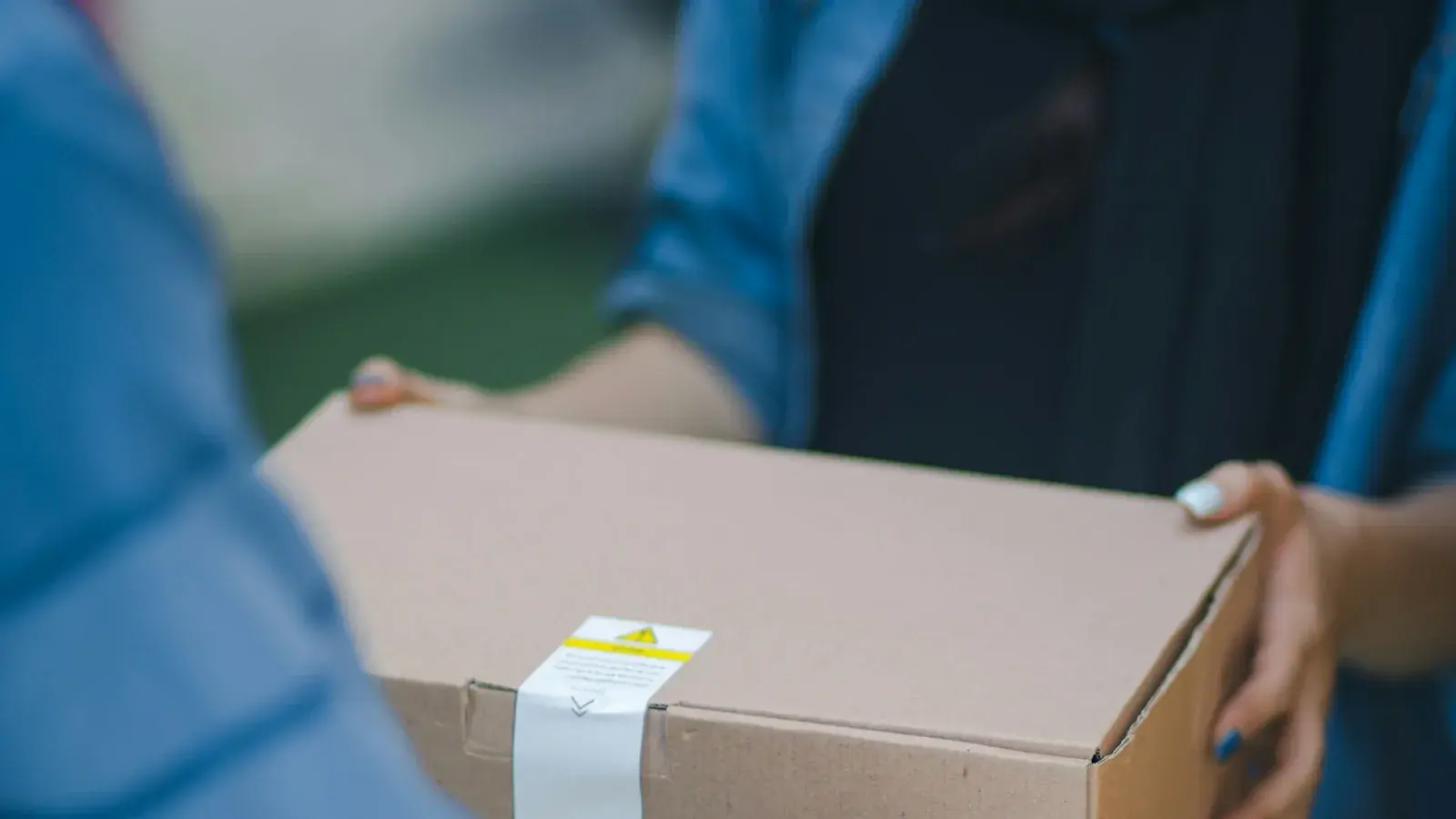 Logistics professional reviewing cargo paperwork for customs processing